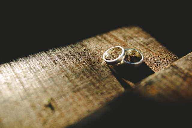 Two engraved rings on a table.