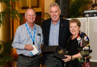 Picture of 3 smiling men receiving an award Thumbnail